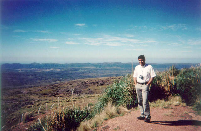 On the ridge facing the site (white speck in background)